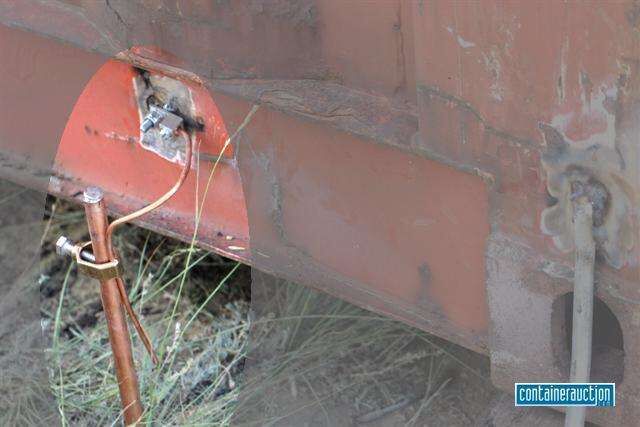 Earthing rod connected to a shipping container